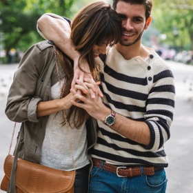 A beautiful community at the heart of all your passions a couple walking through a park