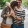 a couple walking through a park