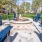 a group of chairs around a fountain