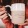 a woman holding a coffee mug