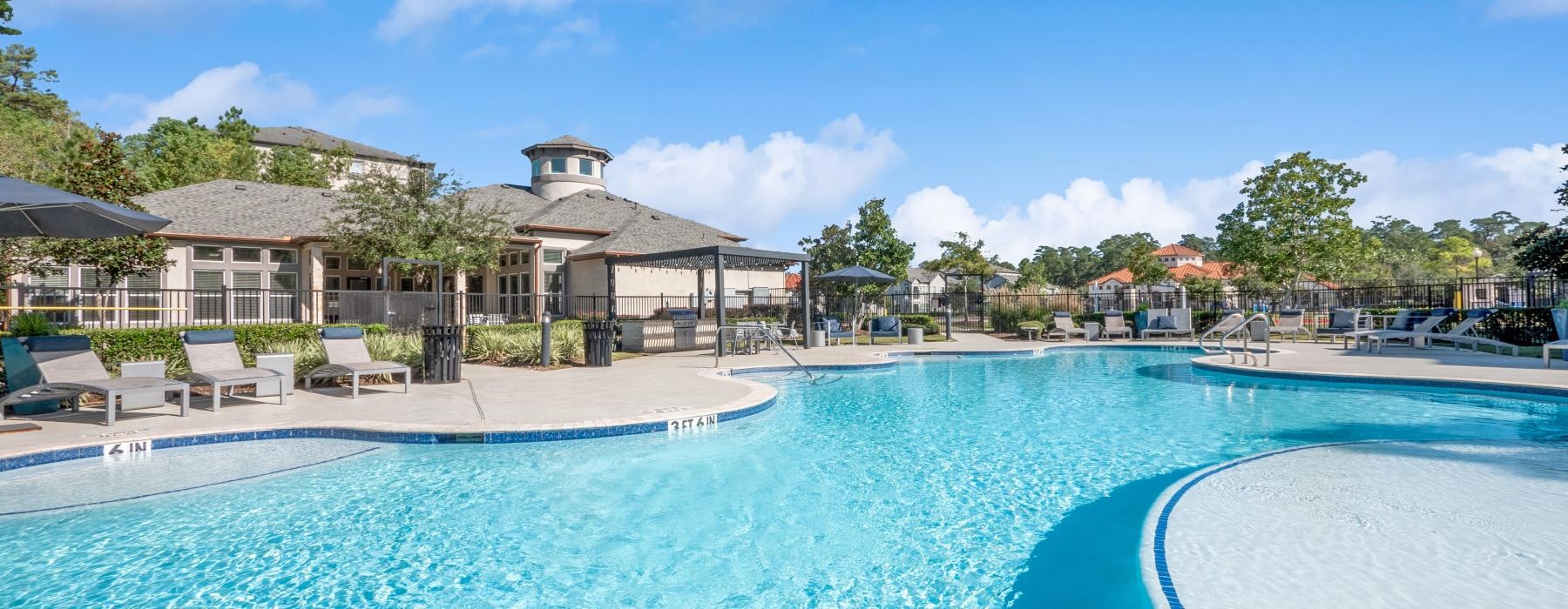 a pool with a building in the background
