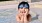 a child playing in a pool